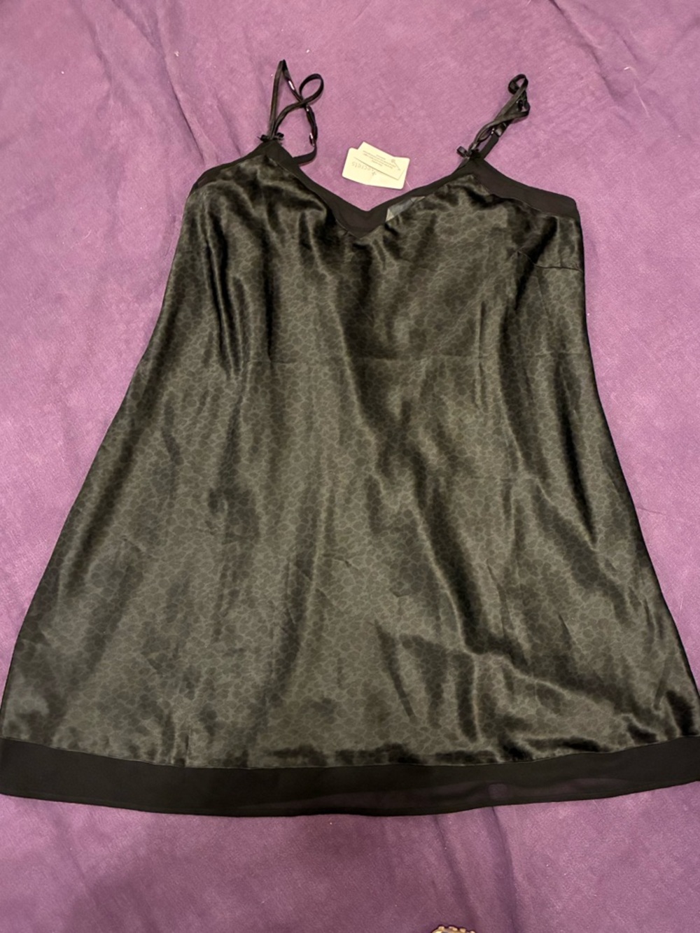 Black Satin Slip Dress with Spaghetti Straps with subtle leopard print.